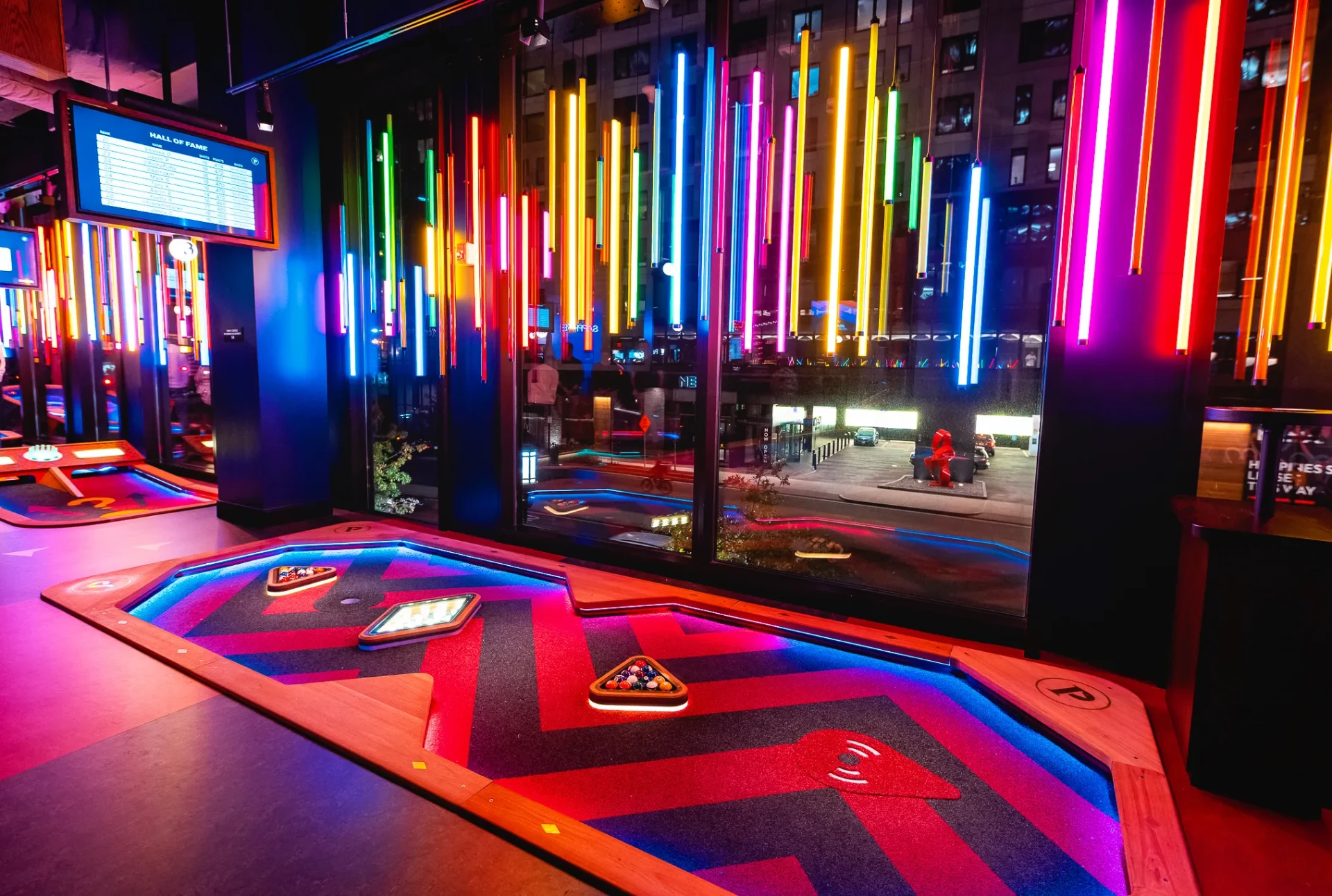 Puttshack neon-lit mini golf course